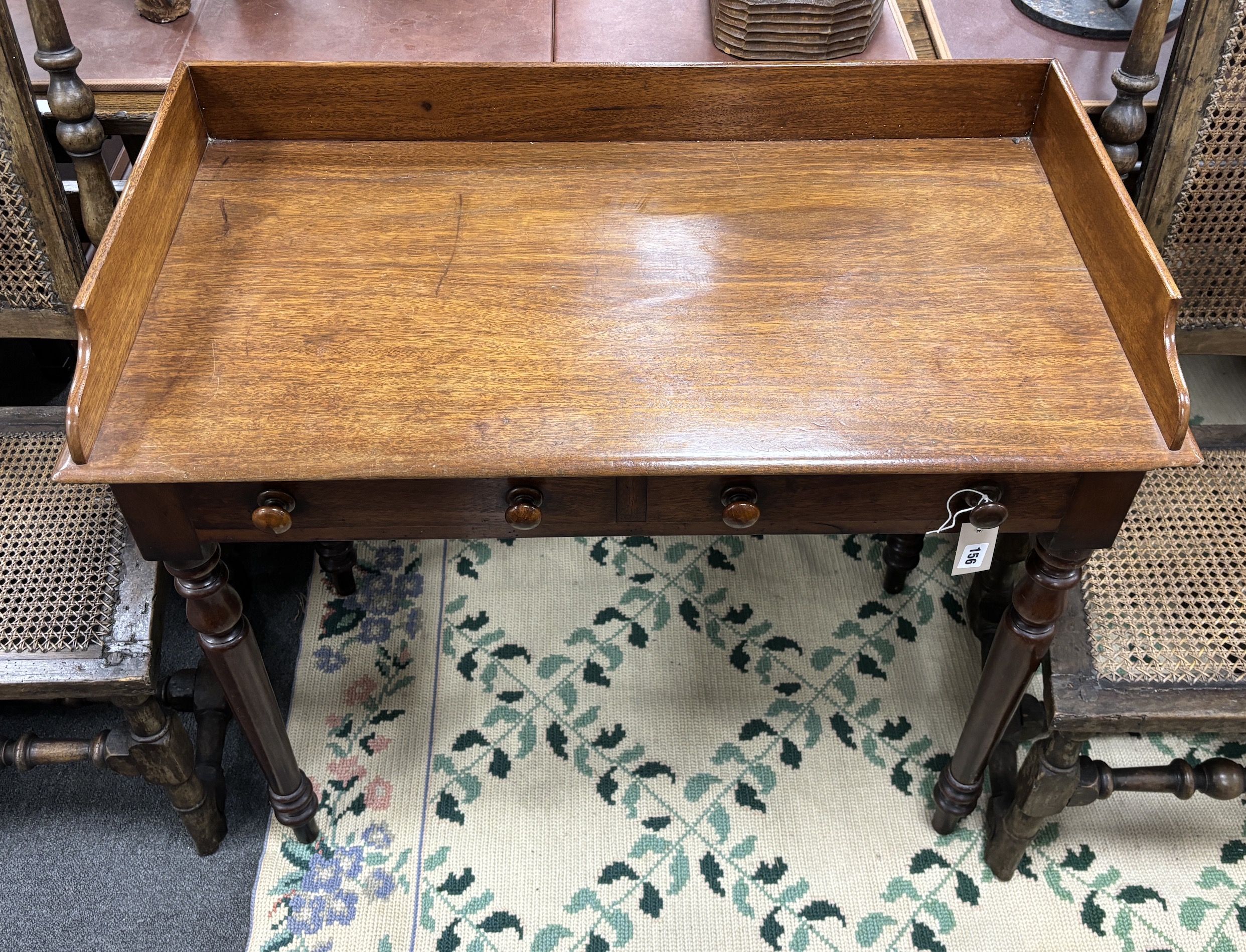 A mid Victorian mahogany two drawer side table, width 91cm, depth 47cm, height 84cm
